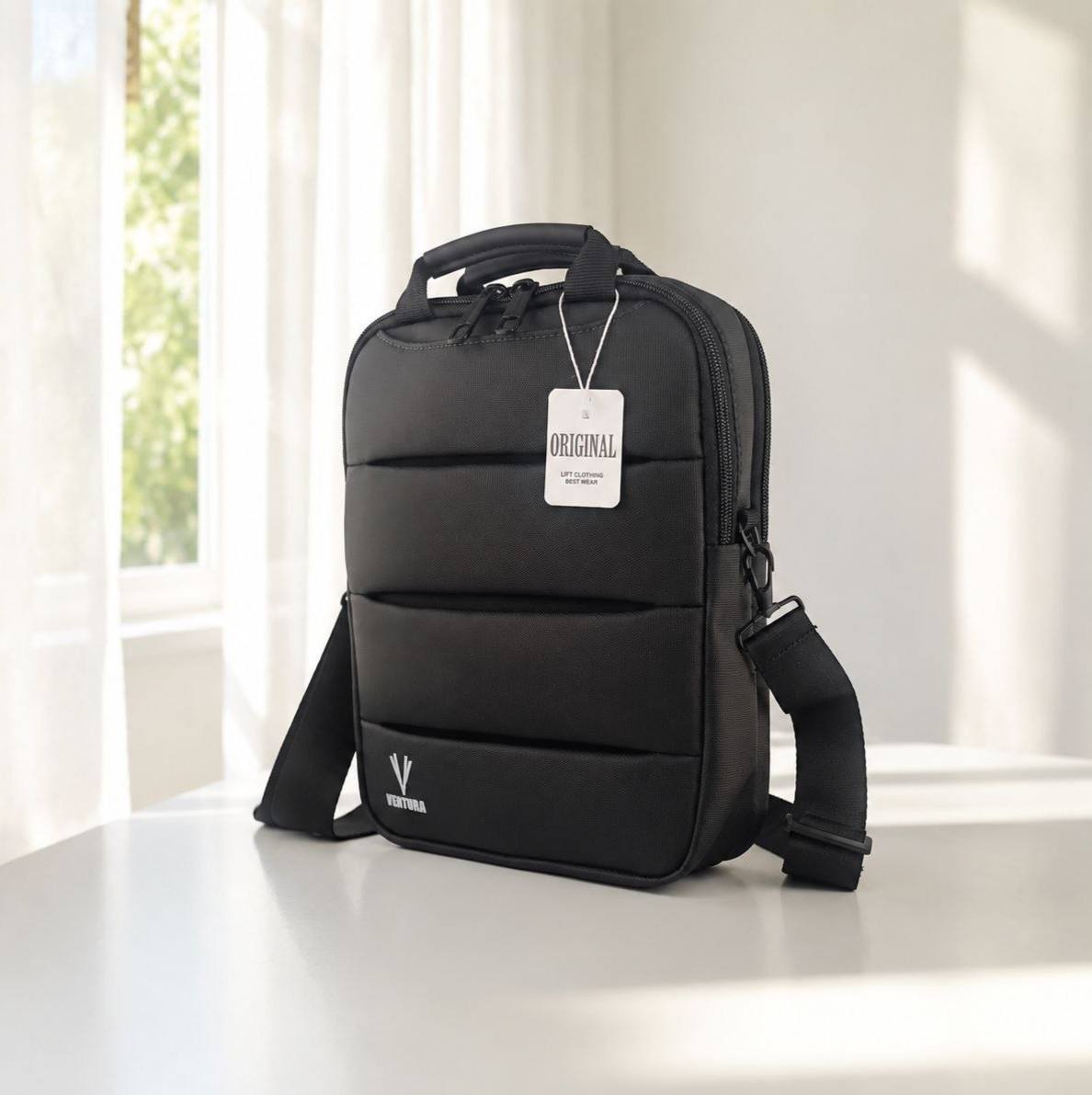 MOFxoNpRO6e5LNVoM1VIgbw21xL8QaBz0rcJEfWCxYo9OlLfnU.jpg کیف مردانه - کد 7215 - Image 1